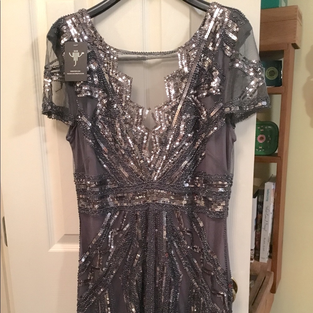 Sequin Cocktail dress or semi formal, short dress.